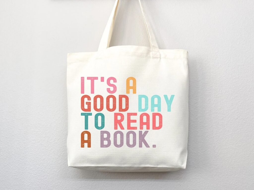 good day to read a book tote bag